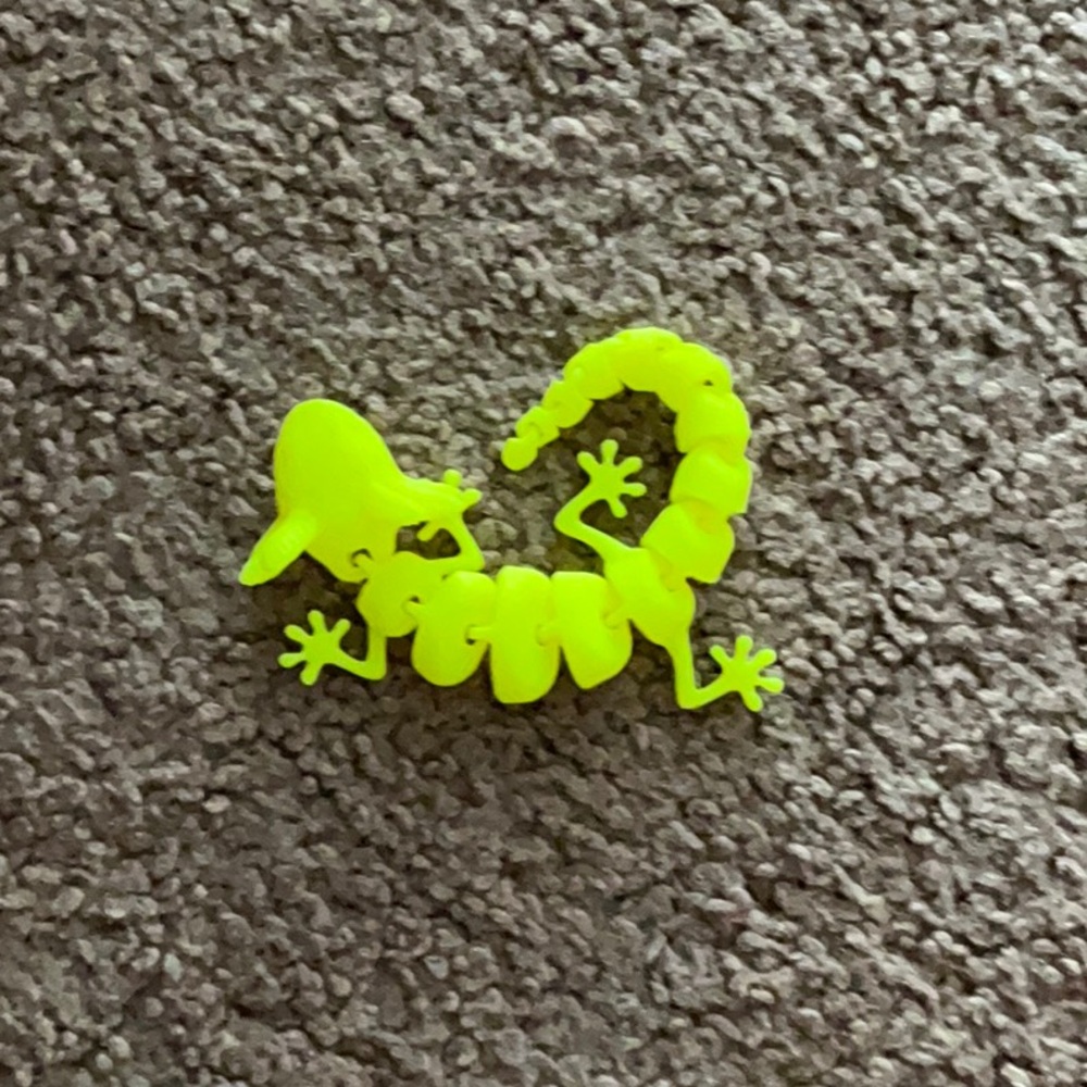 Neon yellow 3-D printed axolotl